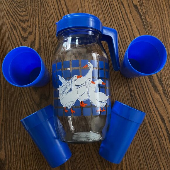 Got this lovely goose pitcher off of marketplace, it also  VINTAGE /NEVER USED  - Blue Geese Glass Pitcher, Cups and Pie Plate Set